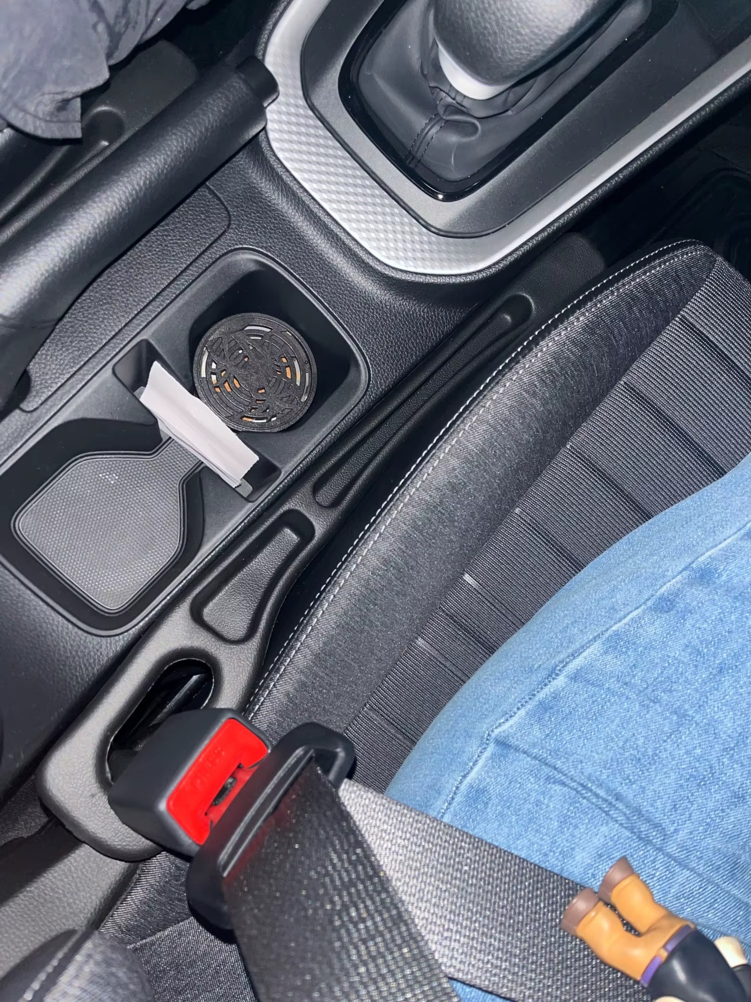 Gap filler installed, person sitting in jeans